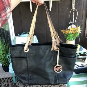 Black and tan Michael Kors tote bag